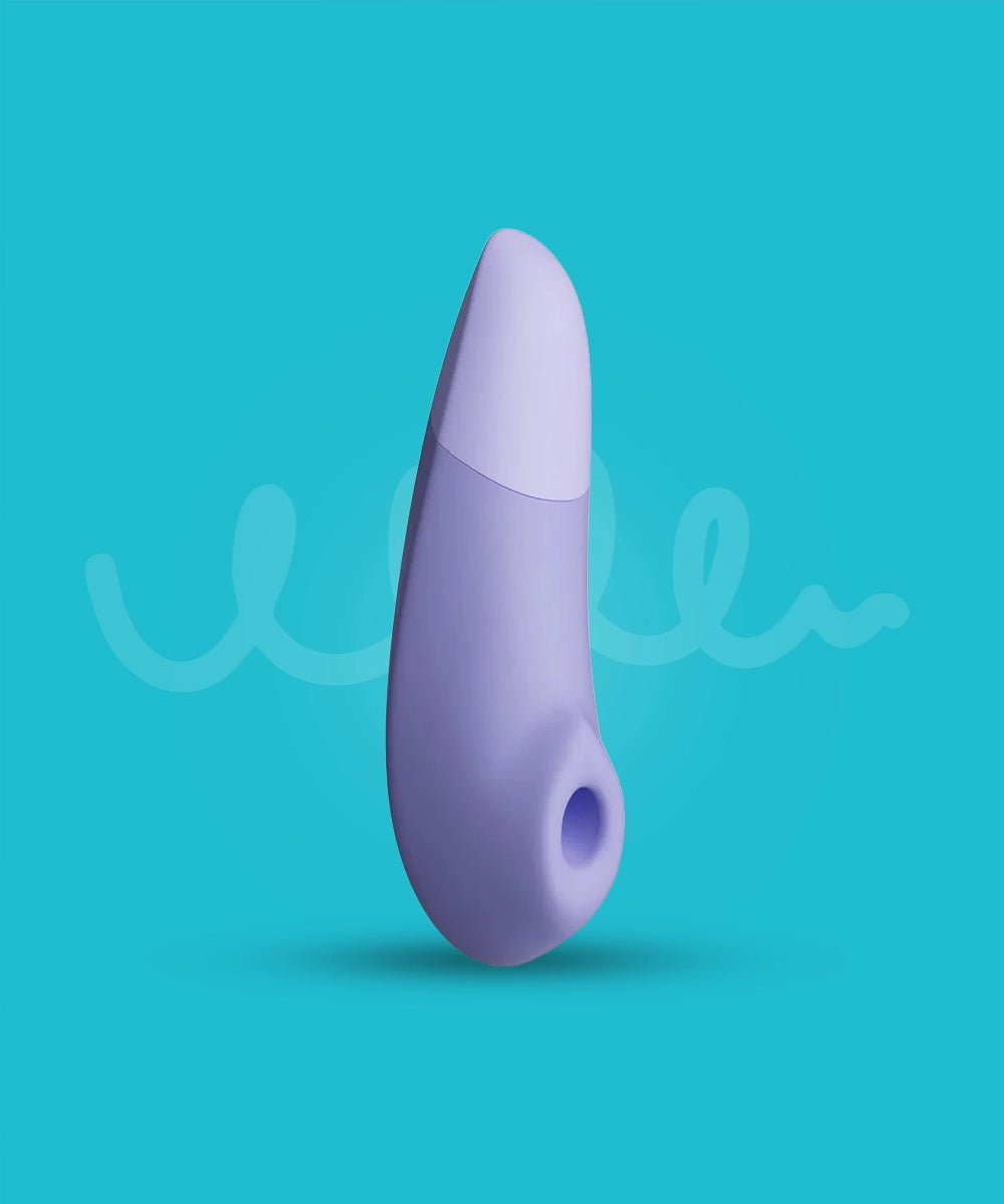 Purple air-pulse clitoral vibrator on a teal background
