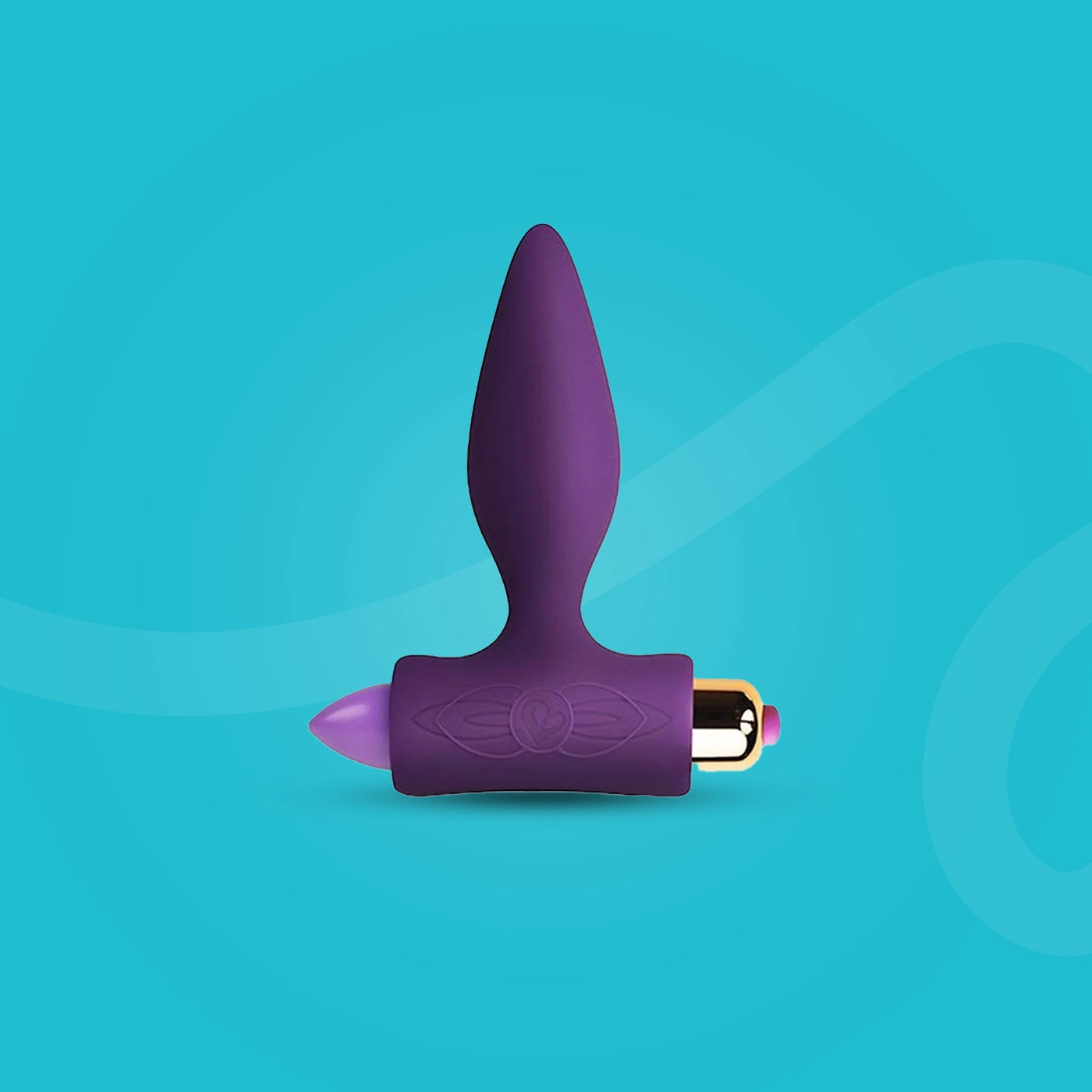 Purple and pink anal plug on a blue background