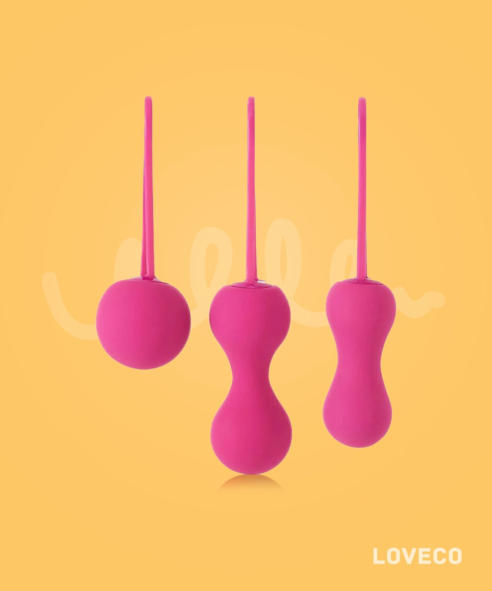 Three pink silicone kegel exercise balls on a yellow background, branded 'LOVECO'.